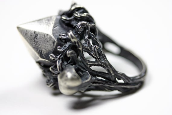 nesting in the underworld. cast crystal and hummingbird skull ring.