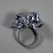 one of us. conjoined twin skull ring. sterling silver.