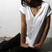 Reserved for serenacottle 2 for 40 deal cuff vneck black m, white m