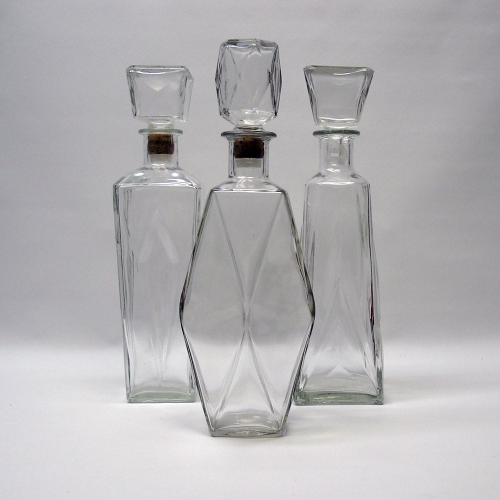 Trio of glass liqueur decanters