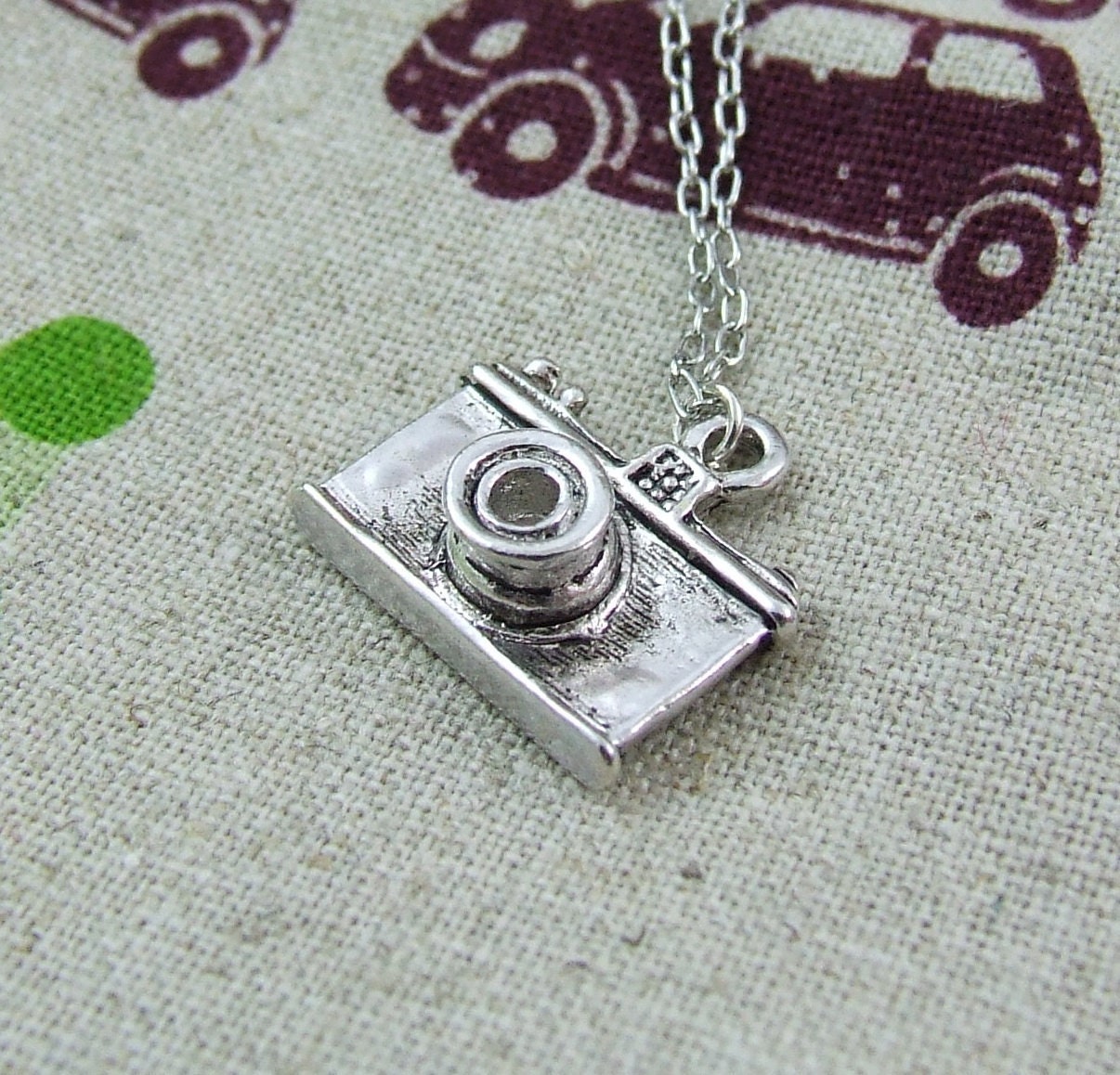 Click and Shoot necklace