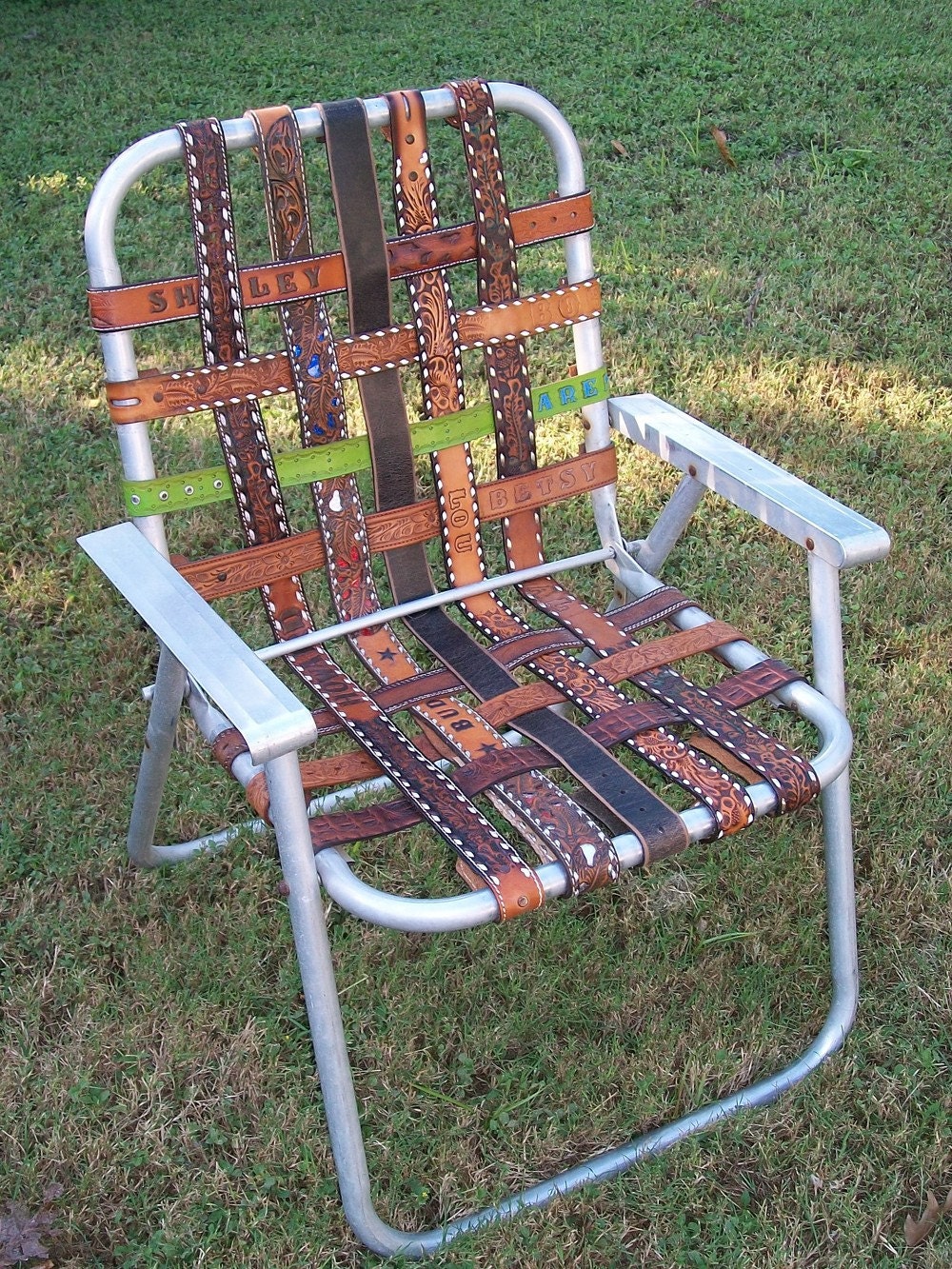 vintage aluminum folding LAWN CHAIR re-webbed with vintage western BELTS yee-haw.