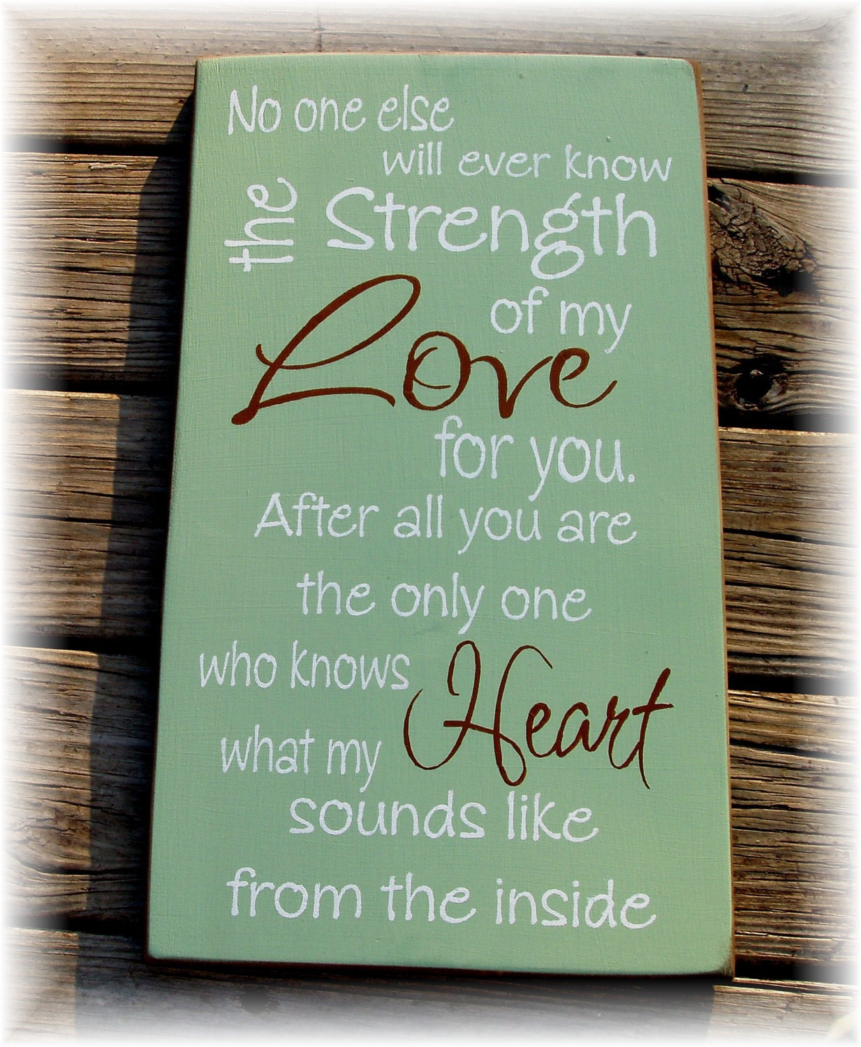 Strength of my love... heart sounds like from the inside wood typography sign