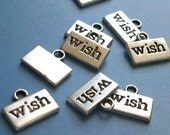 20 'wish' charms, silver tone, 13mm