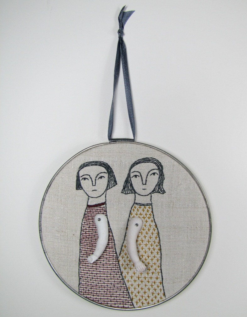 hand embroidery-two women in red and mustard
