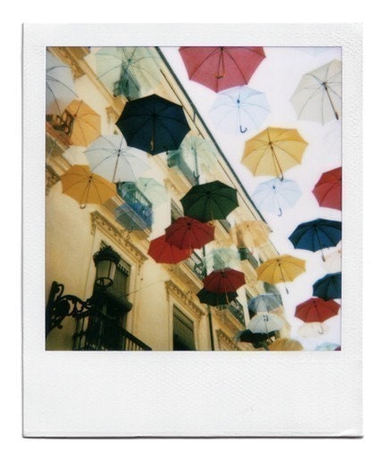 Umbrellas as rain in a 8x10 inches print of a original polaroid photograph