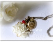 Snow White Necklace made with white rose, swarovski crystal, gold locket, humming bird charm etc.