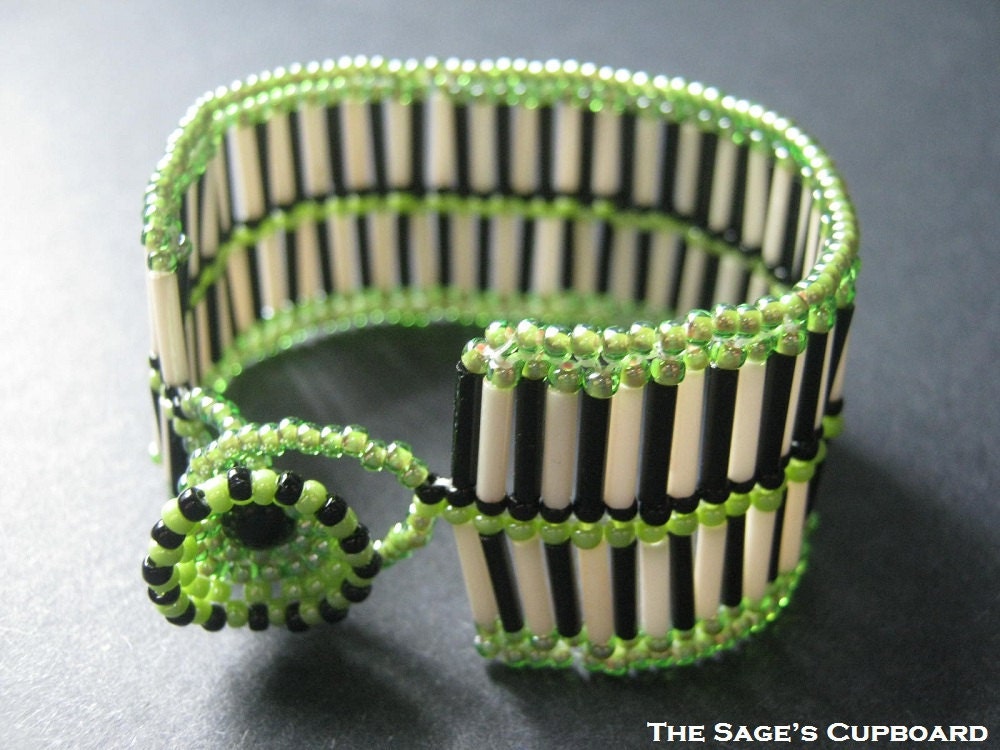 Double Stripe Bracelet. Black and White Beaded Cuff with Bright Green Accents