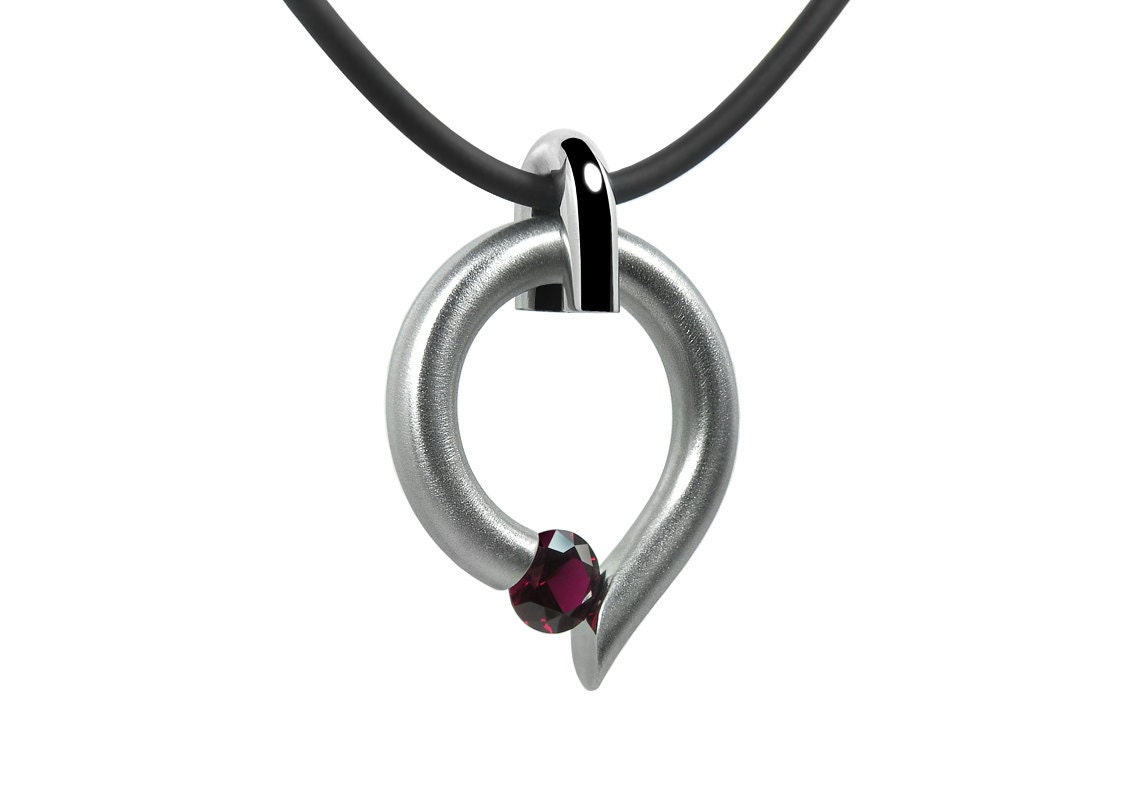 Garnet Tension Set Teardrop Shaped Pendant in Stainless Steel