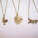 Set of three friendship necklaces. Peace, love, happiness. Brass, gold toned. Dove. Heart with flower. Best friend gift.