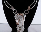 Statement set Inspired by Salvador Dali Half Face Man,Necklace, earrings, chocker Rhodium made by Shoptillyoudropnow on Etsy