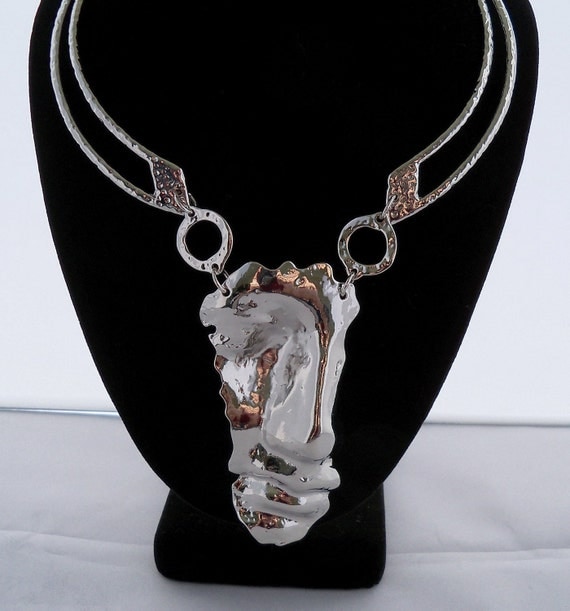 Statement set Inspired by Salvador Dali Half Face Man,Necklace, earrings, chocker Rhodium made by Shoptillyoudropnow on Etsy