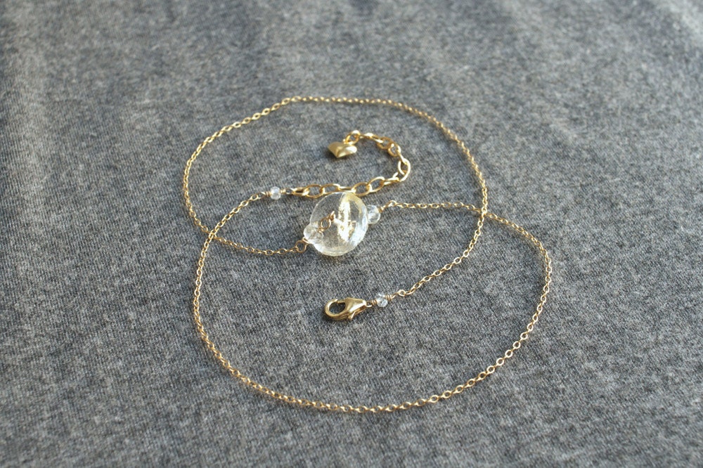 gold leaf crystal necklace . supernova