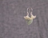 yellow lucite flower earrings . elanor