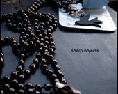LOVE IS - layered stamped silver tag, petite sparrow, crystal & gunmetal charm chain NECKLACE