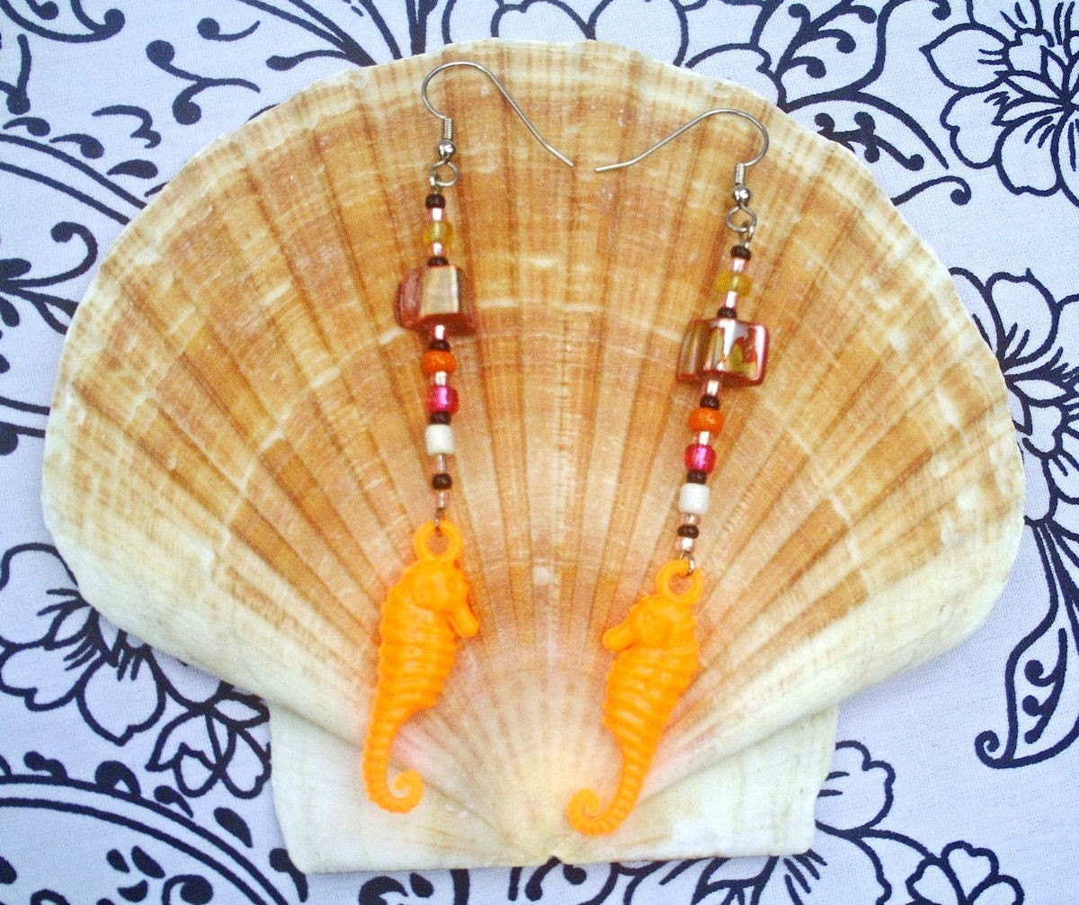 seahorse earrings in cheerful orange
