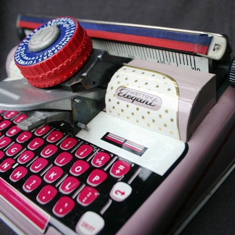 The Elegant pink typewriter. Vintage collectible toy.