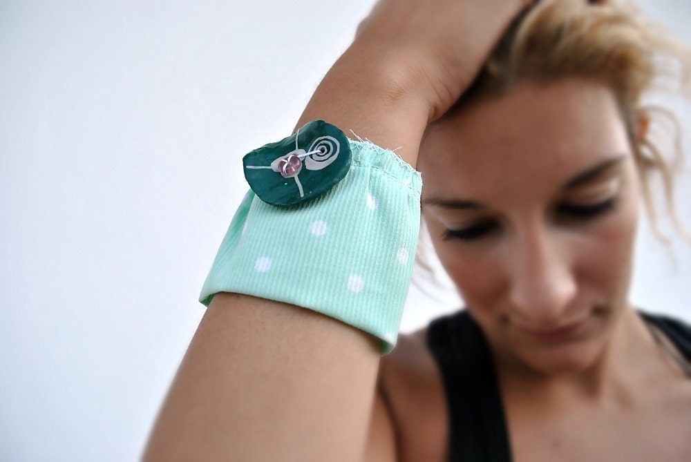 Cuff bracelet from aqua fabric with dots and green hand-painted wood clay bead