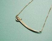 Golden sword necklace