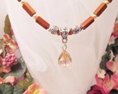 Pink Crystal Teardrop Pendant on Goldstone Necklace