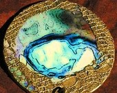 Blue Pendant Abstract Cat Eye with gold lace