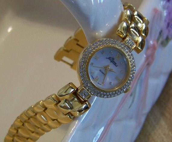 Vintage Goldtone High Polished Panther Link Stampato Bracelet Watch by Pierre Jacquard