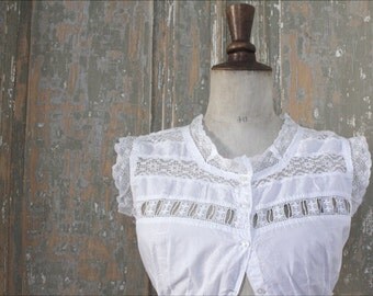 Antique cotton top with embroidered initials "G C"
