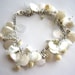 Upcycled jewelry charm bracelet pearl white made of recycled plastic bottles eco friendly wedding bridal bridesmaid romantic