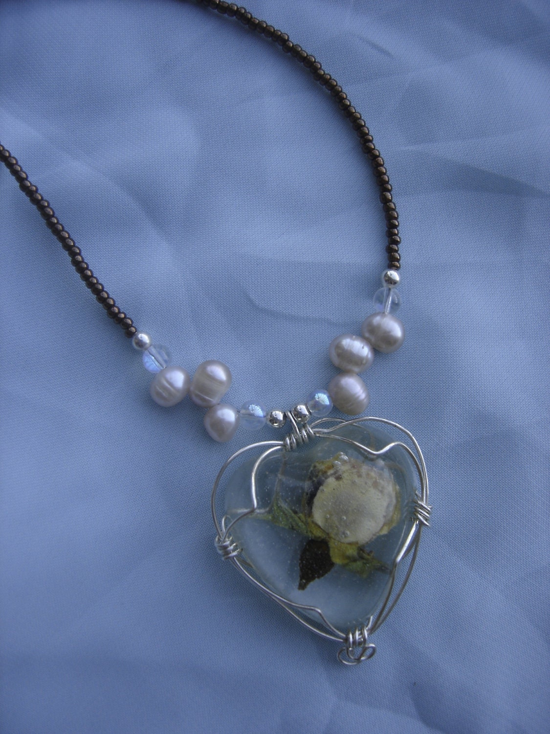 Necklace, pressed flower jewelry. Necklace, Necklace with a heart  pendant containing a natural rose.