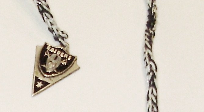 Oakland Raiders - Black, White & Silver NFL Book Thong with Official Silver Charm