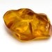Amber transparent cabochon, cognac colored