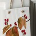Painted Welcome Sign with Dogwood Leaves and Red Berries