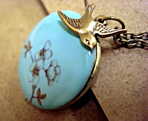 Turquoise enameled locket necklace with cherry blossom branch, long necklace and bronze swallow