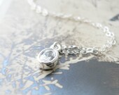 tiny crystal necklace - frost - simple silver jewelry by windowsill