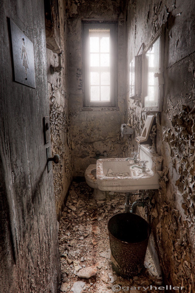 Old Abandoned Ladies Room, Old Toilet Bathroom in Asylum, Urban Exploration, HDR, Color Photograph of a ladies bathroom in an old building - garyhellerphotograph