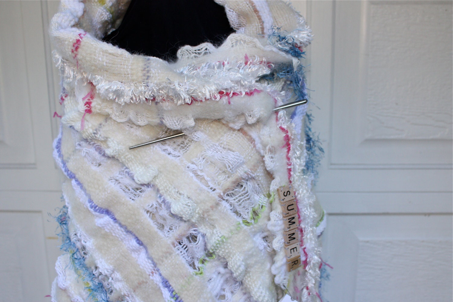 Summer, a Small Wrap in white with stripes of purple pink and blue
