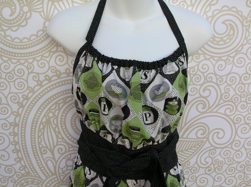 Womans Apron with Dots and Salt and Pepper Shakers