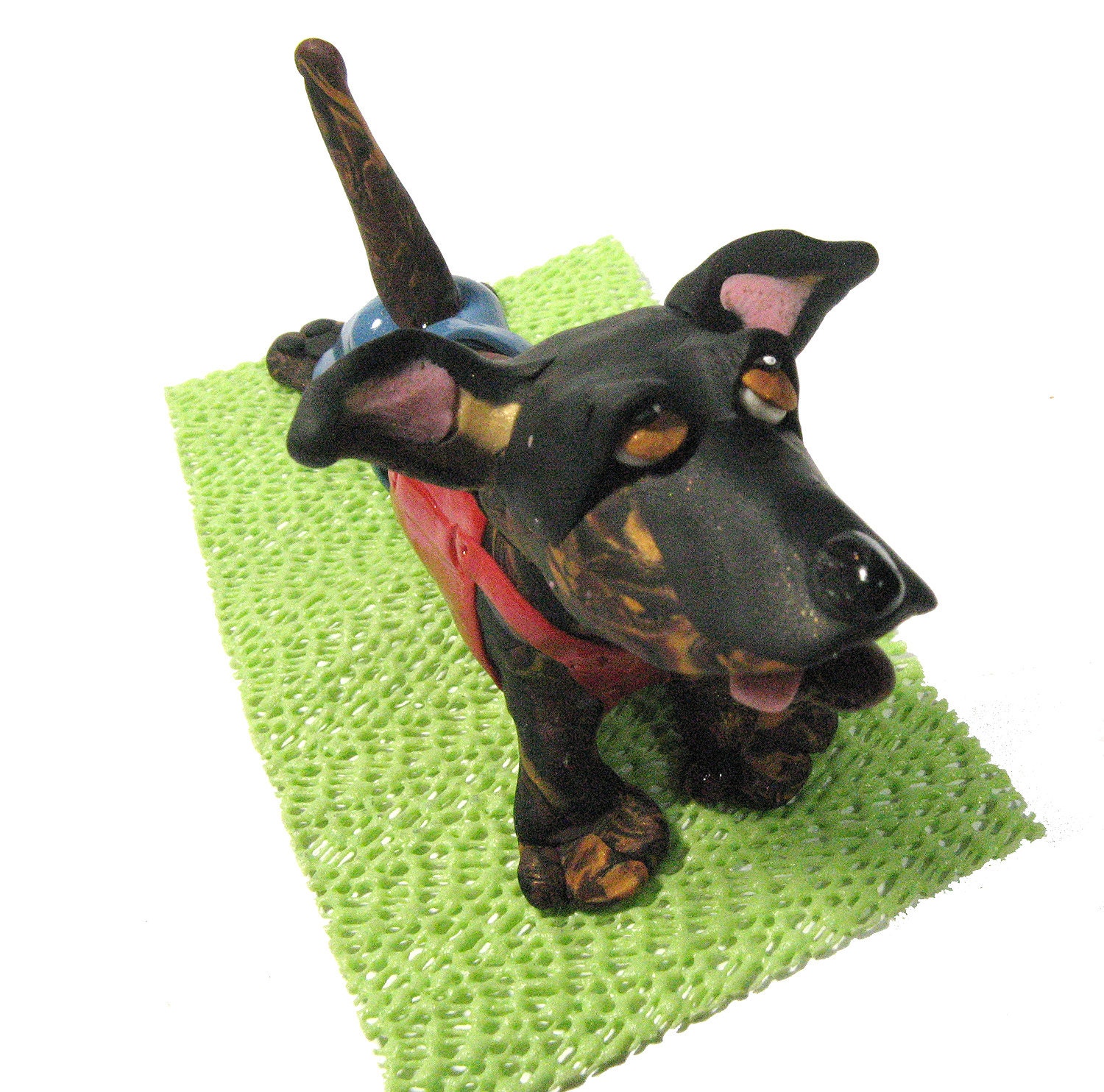 dog in yoga pose statue