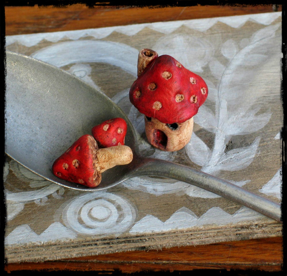 mushroom miniature faery house and mushrooms in ceramic