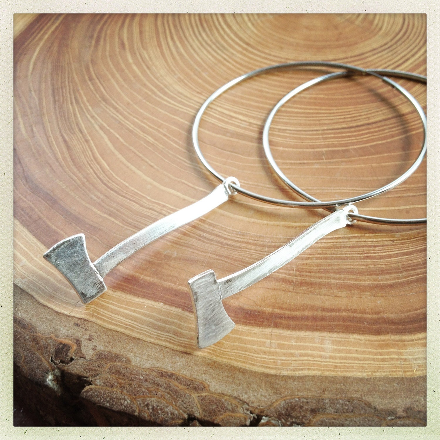the shiny axe hoop earrings