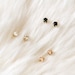 nova - tiny gold stud earrings by elephantine