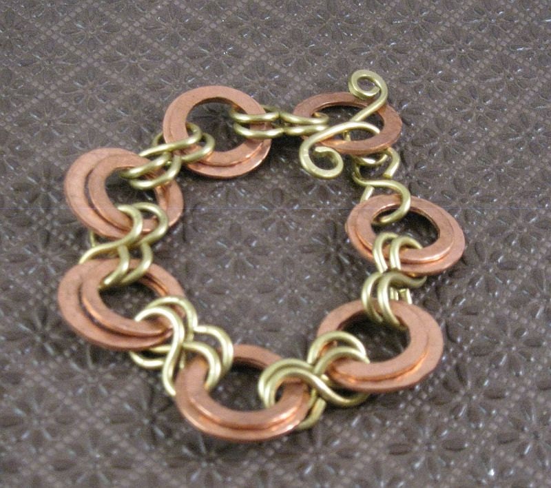 Hammered copper circle and brass chain bracelet