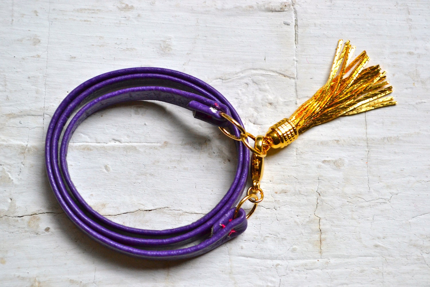 royal purple genuine leather & gold triple wrap bracelet with tassel