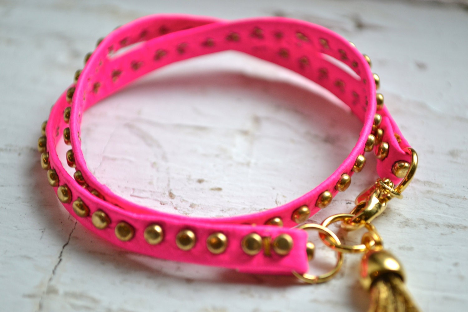 studded pink neon genuine leather & gold double wrap bracelet with gold tassel