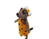 Prehistoric meerkat, caveman meercat, faux fur, knitted caveman, knitted meerkat