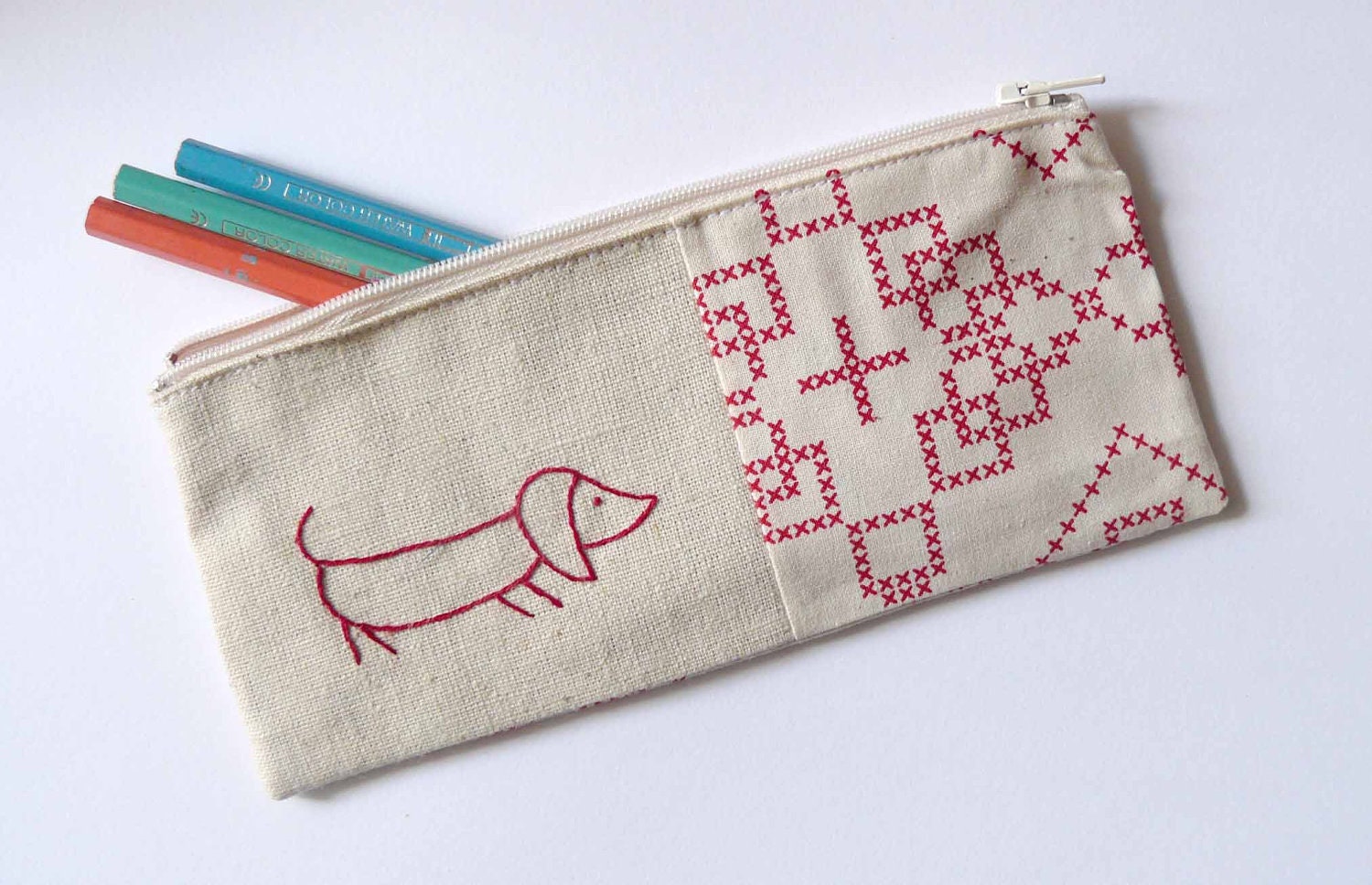 pencil case with red sausage dog embroidery. cross stitch patterned taupe fabric - edwardandlilly