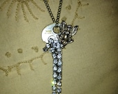 Vintage angel key and diamond like drop necklace