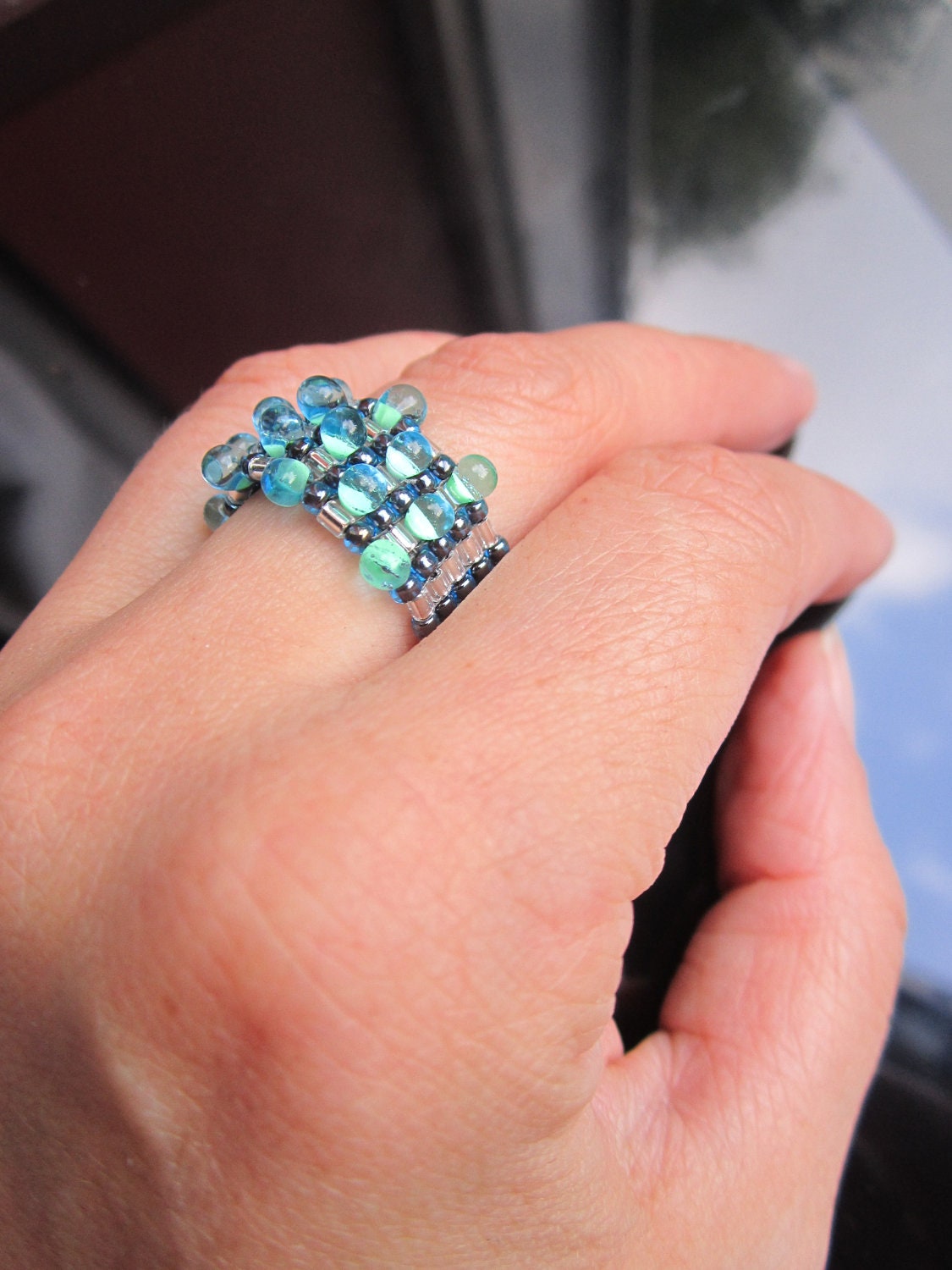 Tear drop beaded ring made with miyuki drop seed beads blue and green