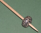 African bead-whorl support spindle