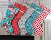 Set of Five Christmas Stockings in Red, Teal and Pink